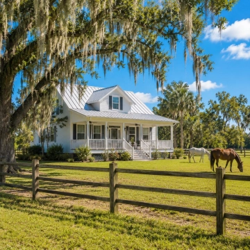Buckingham Fort Myers Area Homes Country-style home with fenced acreage and horses representing Buckingham near Fort Myers